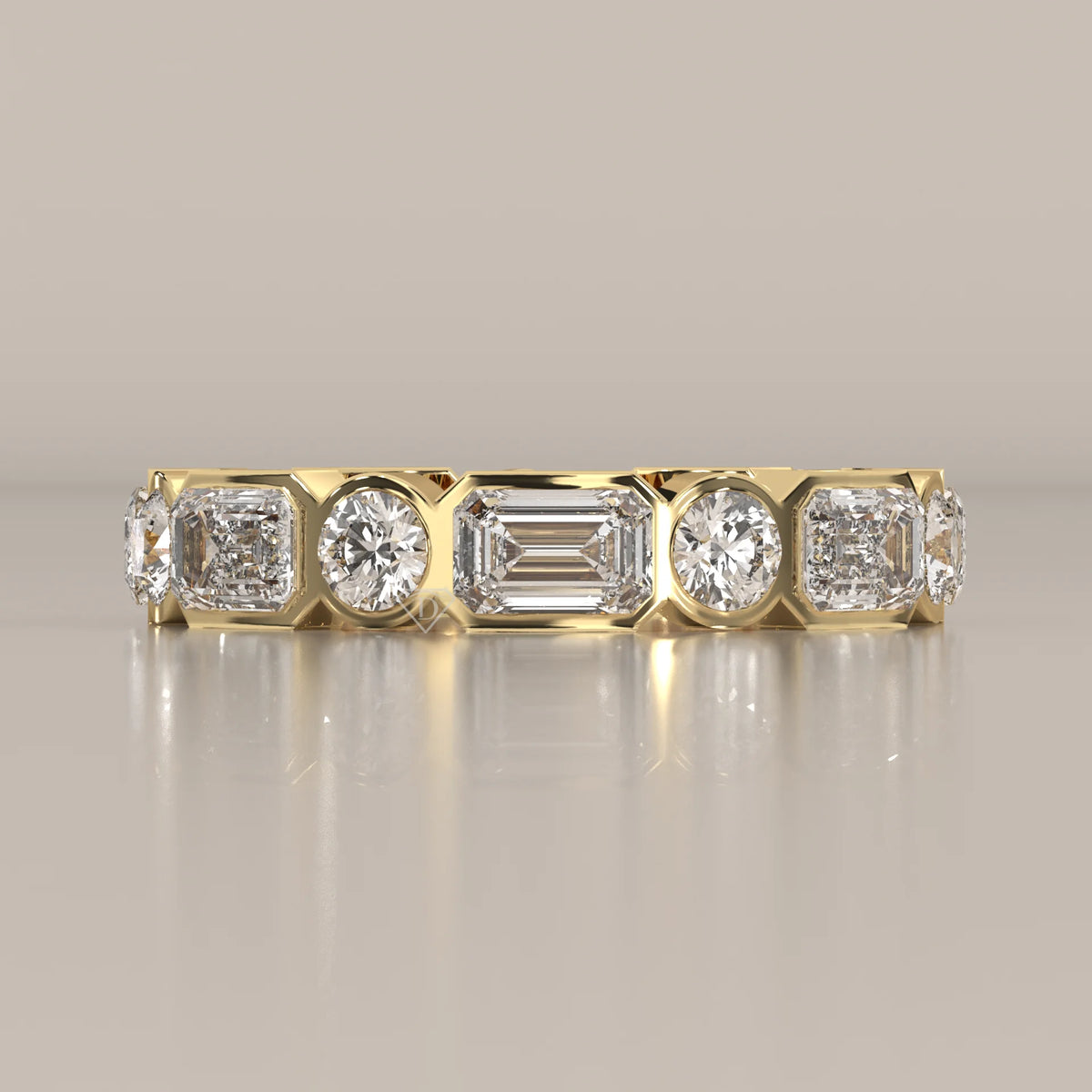 Emerald and Round Lab Grown Diamond Bezel Set Eternity Band in yellow gold, shown from the front.