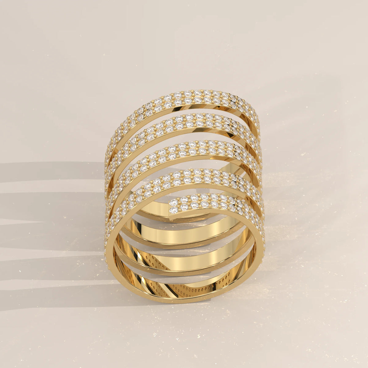 Round Lab Grown Diamond Five Coil Wrap Ring with Triple Row Pave in yellow gold, shown from the front.