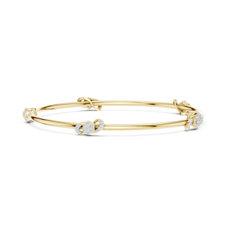 Flat-Lay: Round Diamond Bangle with Prong Setting in 14k Yellow Gold - Lab Grown - Driona Jewels