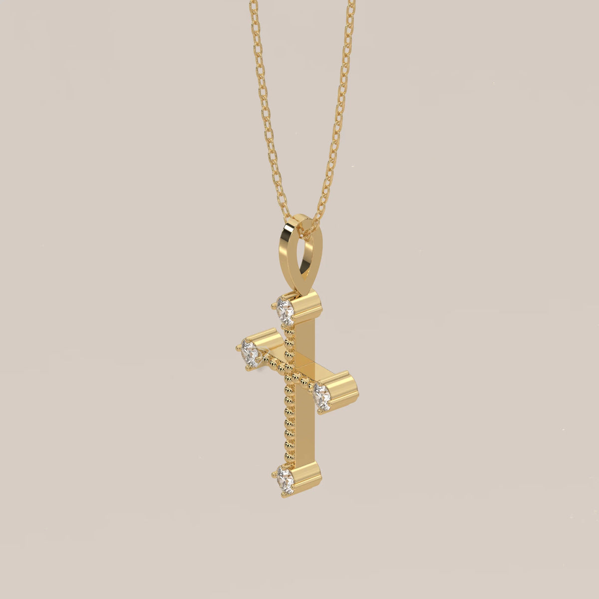 Beaded Gold Cross Pendant with Round Lab Grown Diamond Tips in yellow gold, shown from the side.