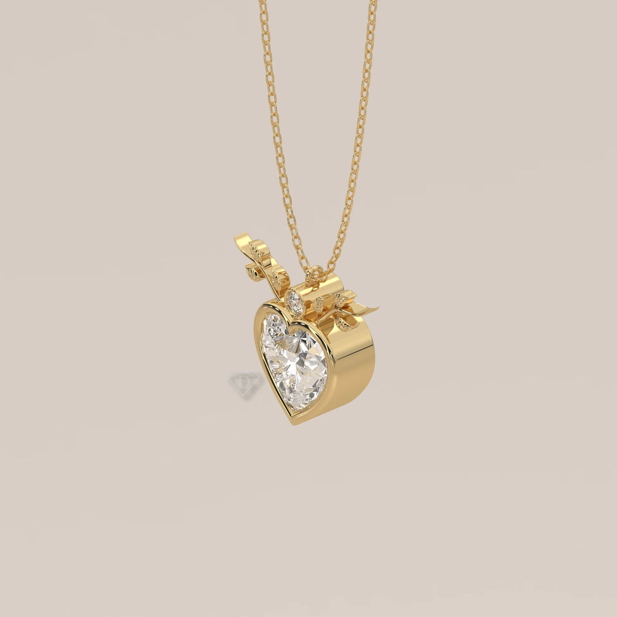 Bezel Heart Lab Grown Diamond Pendant with Leafy Branch Crown in yellow gold, photographed head-on.
