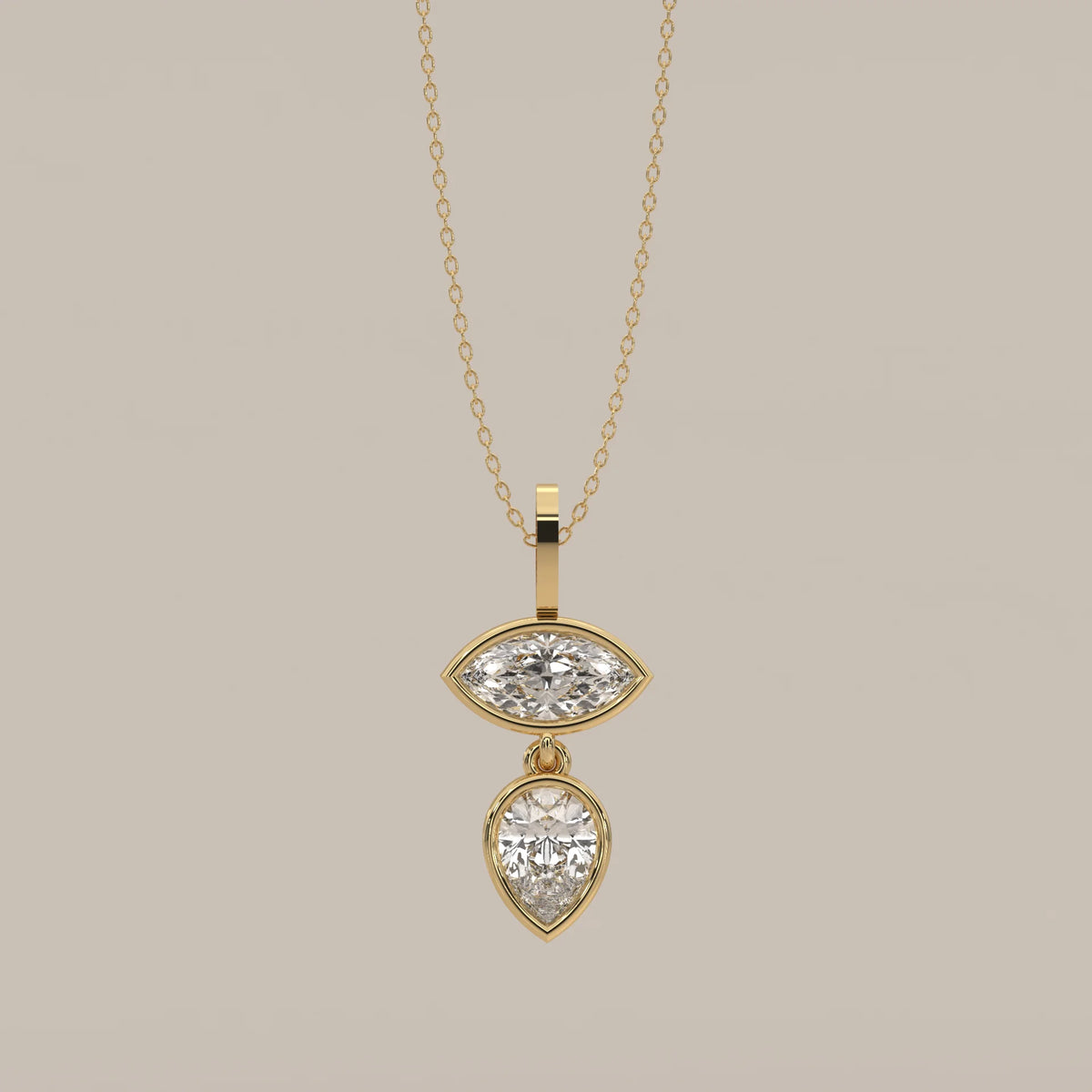 Bezel Marquise and Pear Lab Grown Diamond Articulated Drop Pendant in yellow gold, shown from the front.