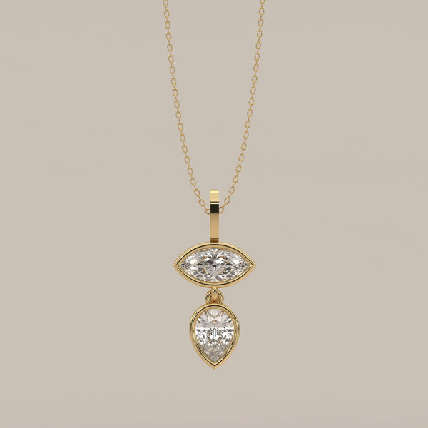 Bezel Marquise and Pear Lab Grown Diamond Articulated Drop Pendant in yellow gold, shown from the front.