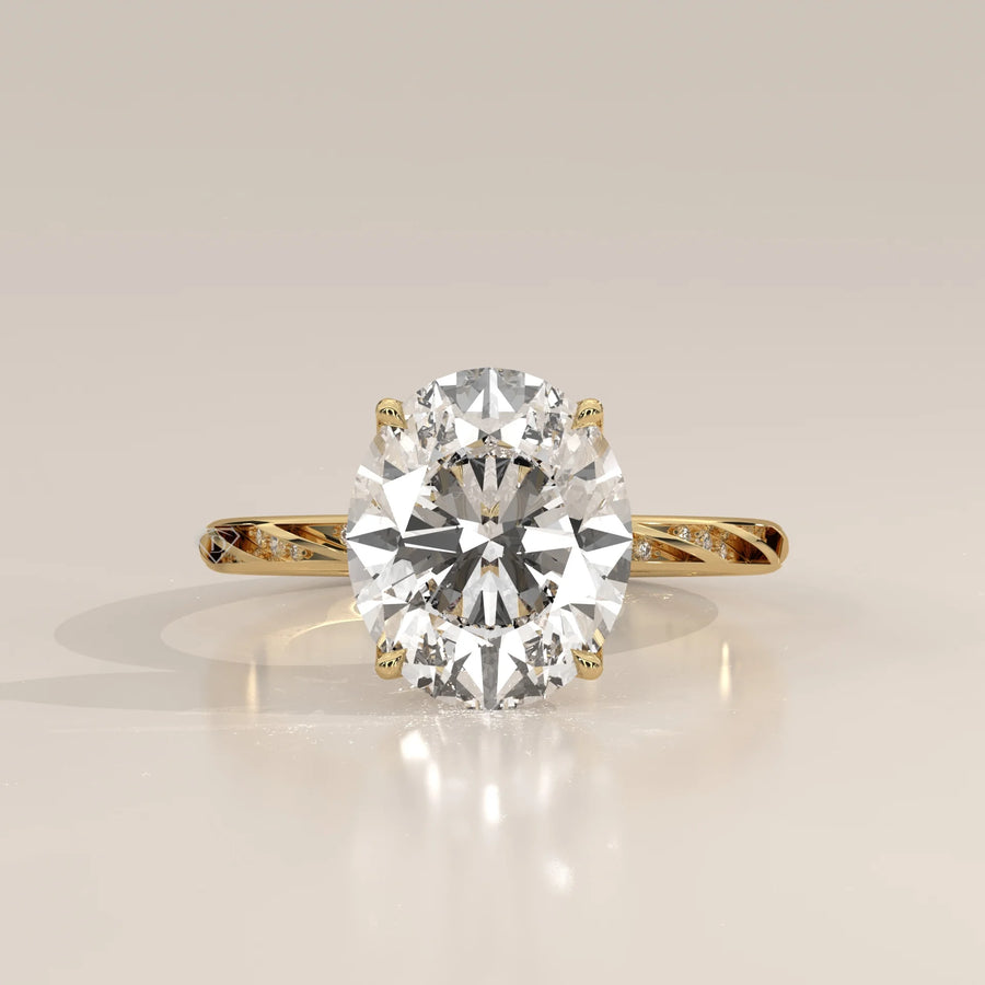 Blier 5 Carat Oval Lab Grown Diamond Ring, Twisted Pave Band in yellow gold, shown from the front.