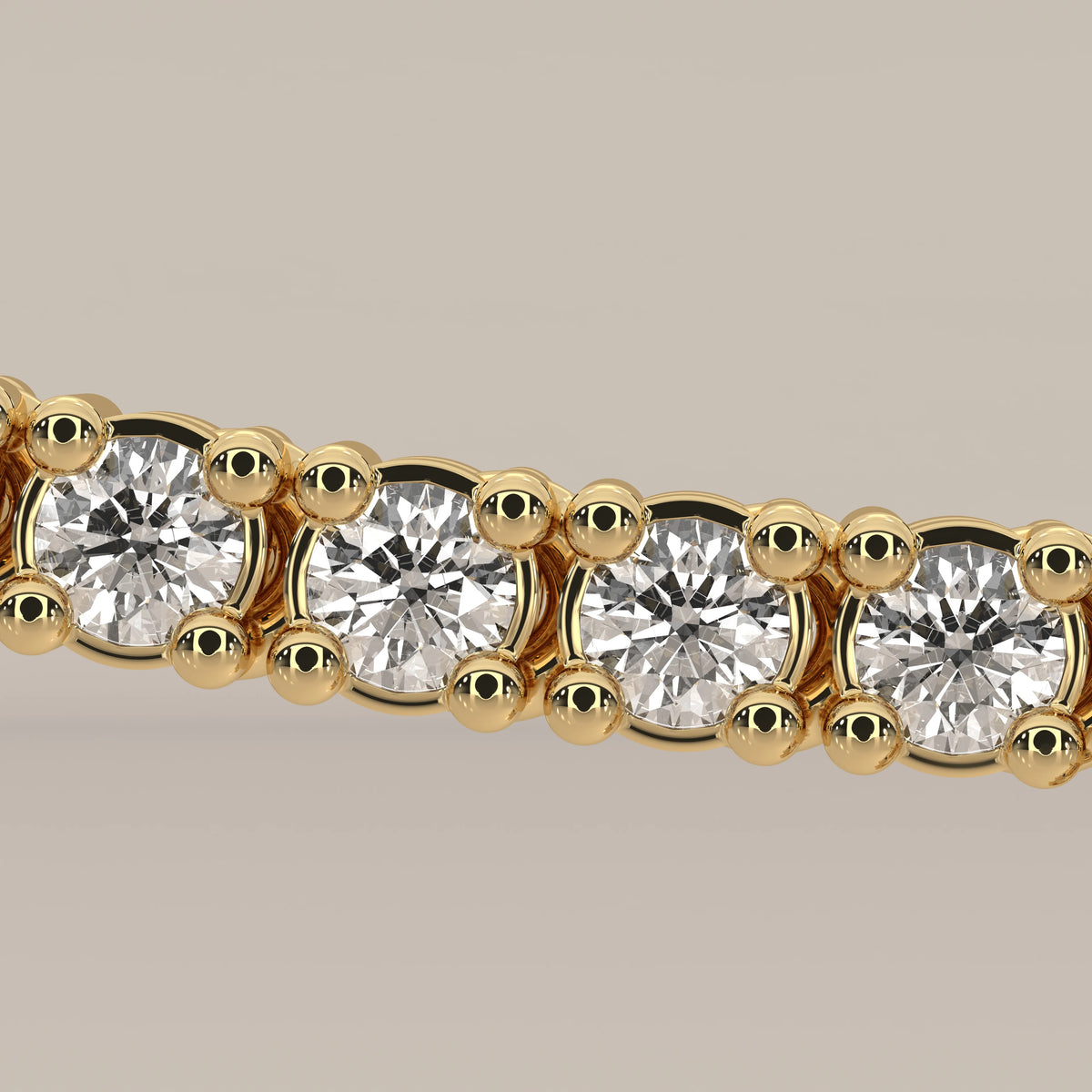 A pear halo lab grown diamond teardrop tennis necklace in yellow gold, shown in close-up.