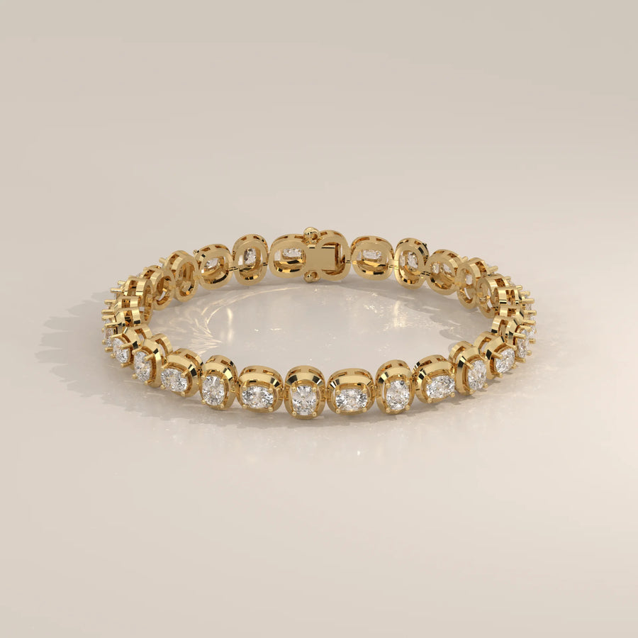 A delicate gold bracelet adorned with round cut diamonds