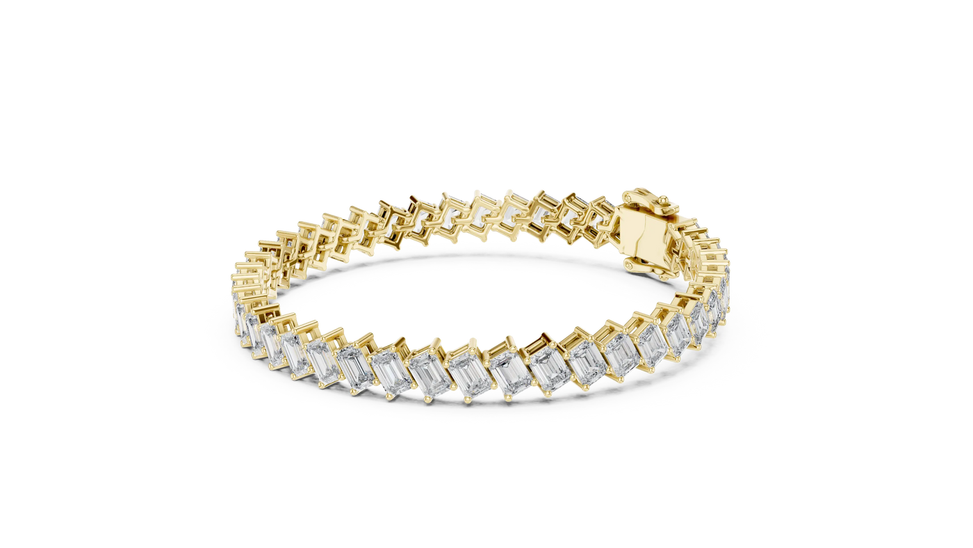 Flat Lay: Emerald Cut Diamond Bracelet with Prong Setting in 14k Yellow Gold - Lab Grown - Driona Jewels