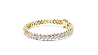 Flat Lay: Emerald Cut Diamond Bracelet with Prong Setting in 14k Yellow Gold - Lab Grown - Driona Jewels