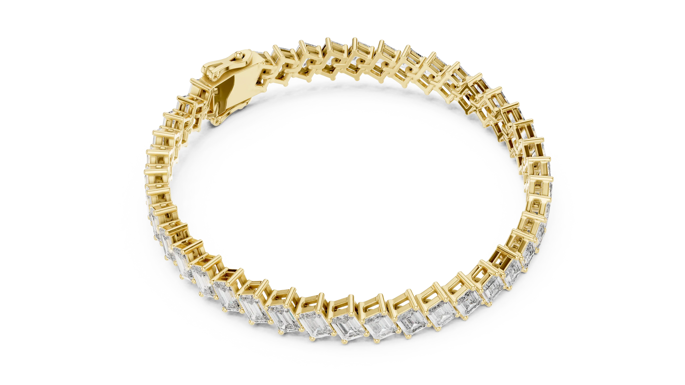 Flat-Lay: Emerald Cut Diamond Bracelet with Prong Setting in 14k Yellow Gold - Lab Grown - Driona Jewels