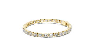 Flat-Lay: Emerald Cut Diamond Bracelet with Tennis Setting in 14k Yellow Gold - Lab Grown - Driona Jewels