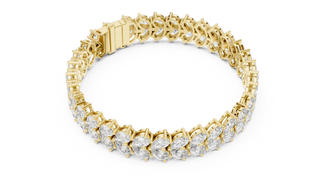 Flat Lay: Oval Diamond Bracelet with Prong Setting in 14k Yellow Gold - Lab Grown - Driona Jewels
