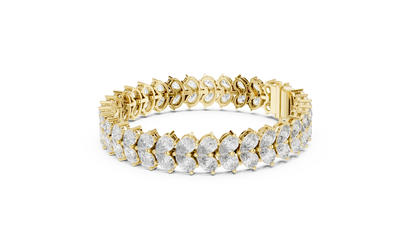 Flat Lay: Pear Cut Diamond Bracelet with Pave Setting in 14k Yellow Gold - Lab Grown - Driona Jewels
