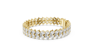 Flat Lay: Pear Cut Diamond Bracelet with Pave Setting in 14k Yellow Gold - Lab Grown - Driona Jewels