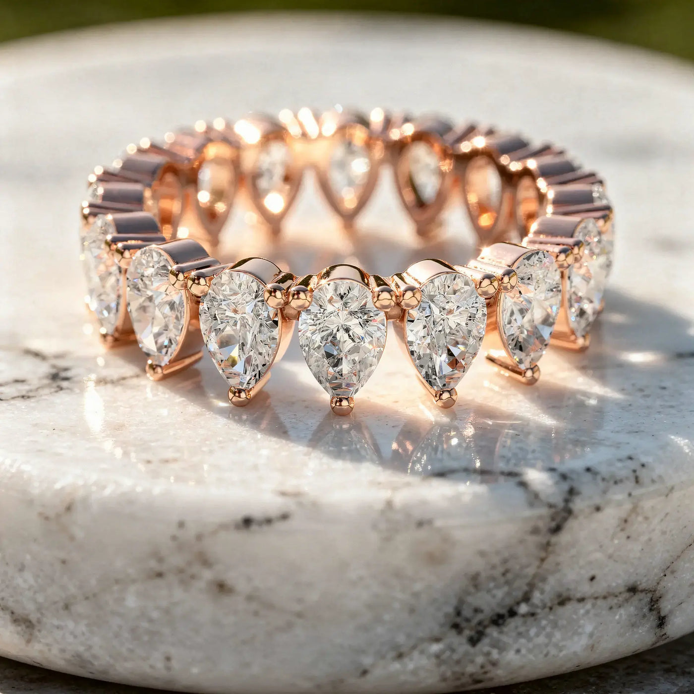Flat Lay: Pear Cut Diamond Bracelet with Tennis Setting in 14k Rose Gold - Lab Grown - Driona Jewels