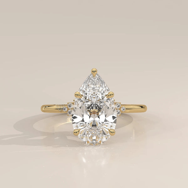 Bronze 5 Carat Pear Lab Grown Diamond Ring, Cluster Shoulders in yellow gold, photographed head-on.