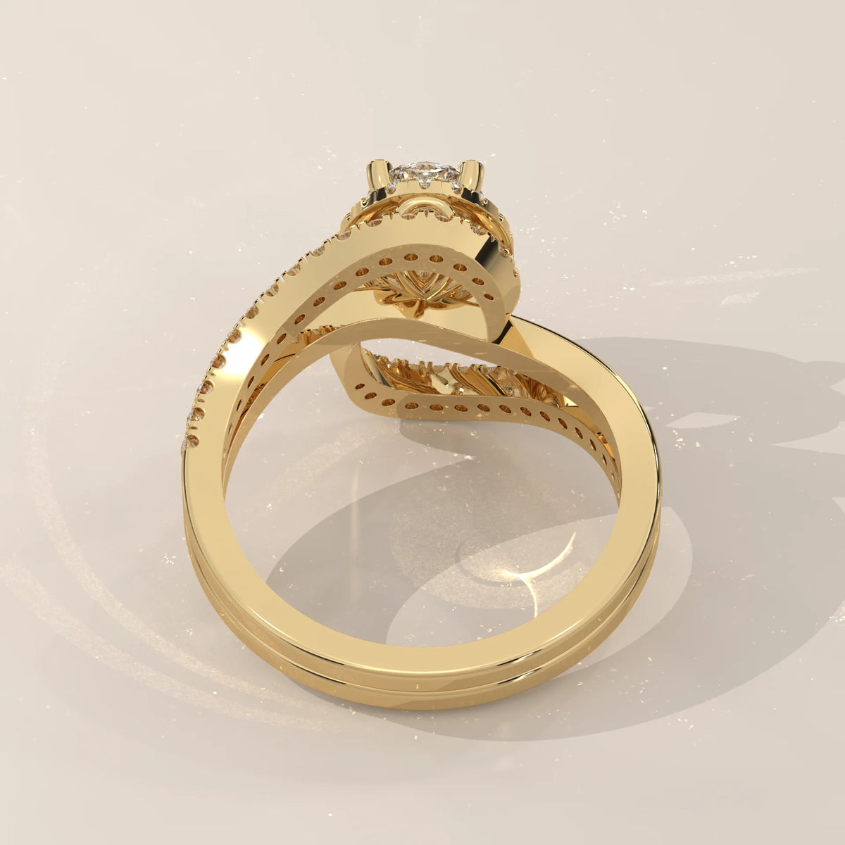 Oval Lab Grown Diamond Halo Ring with Swirling Pave Bypass in yellow gold, shown from the side.