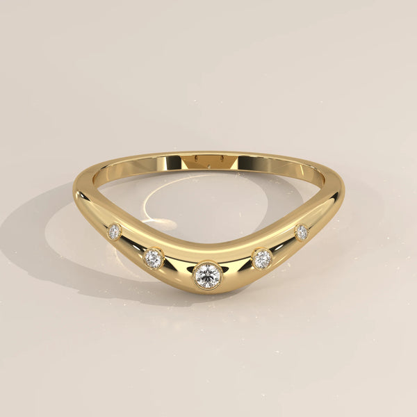 Curved Chevron Band with Five Graduated Bezel Diamonds in yellow gold, shown from the front.