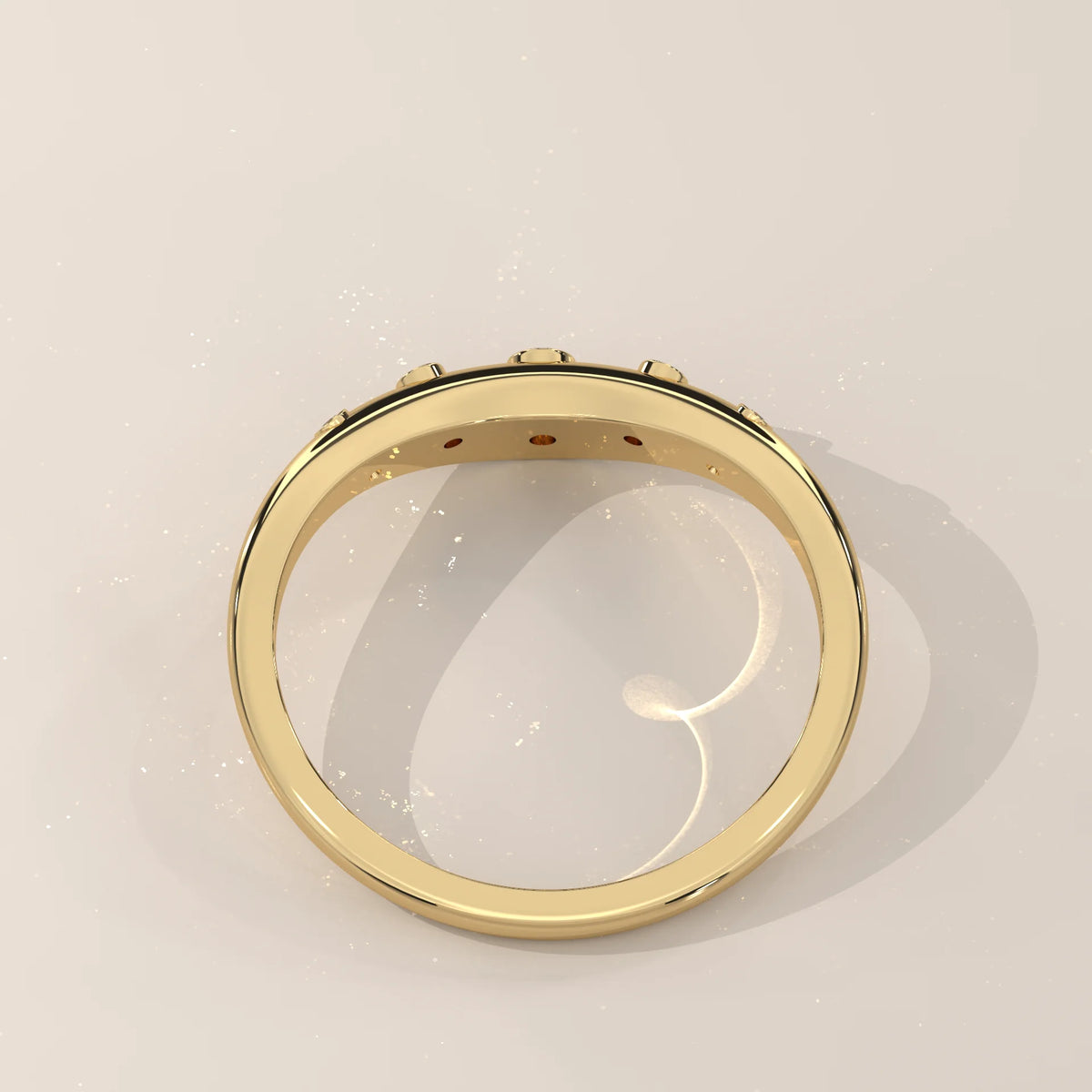 Curved Chevron Band with Five Graduated Bezel Diamonds in yellow gold, shown on a plain background.