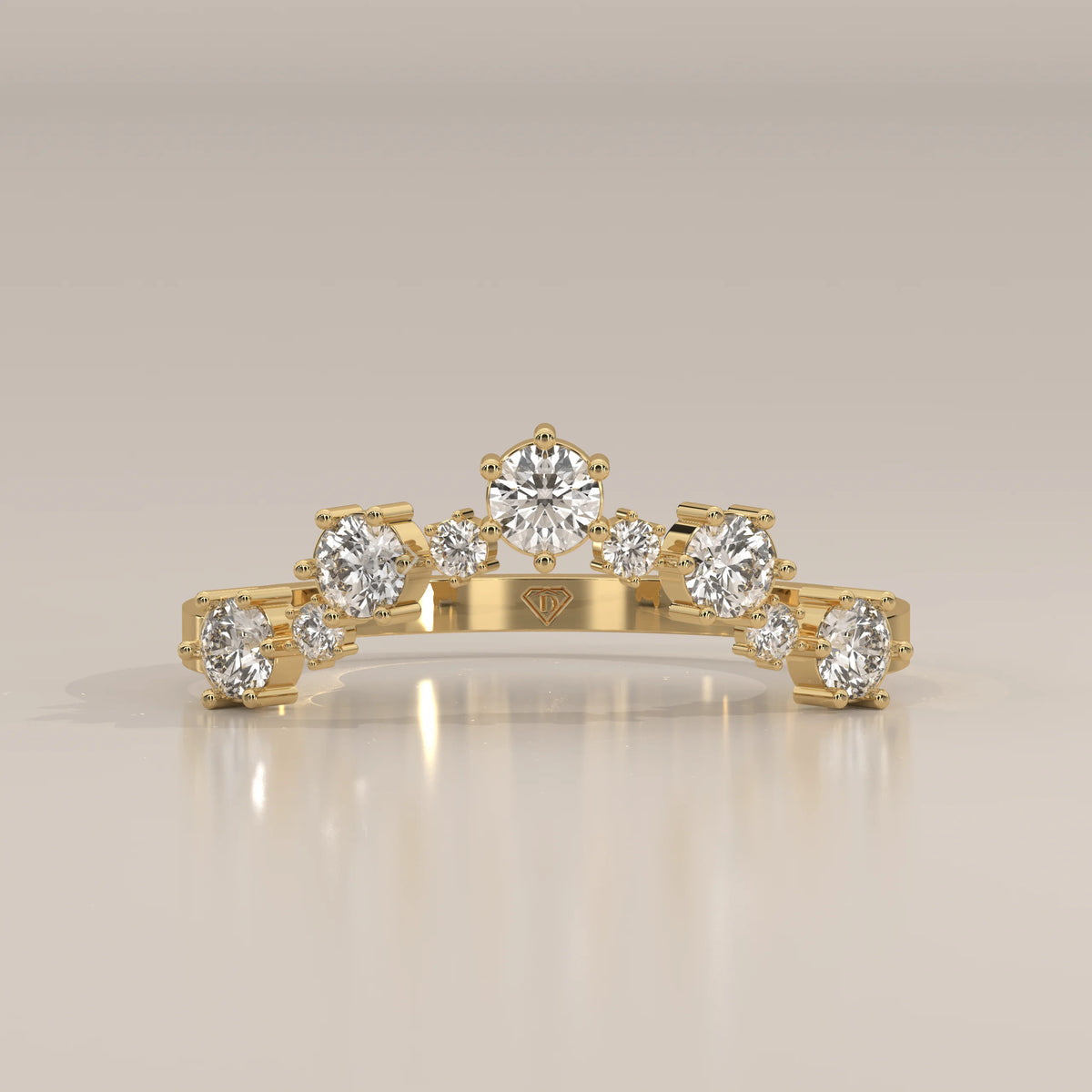 Yellow gold contour band with seven graduated round lab grown diamonds claw set in an arc, photographed head-on.