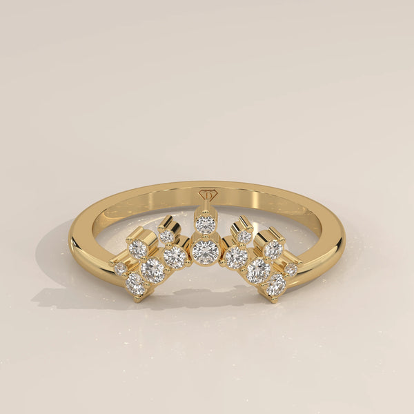 Yellow gold curved band with clustered peaks of round lab grown diamonds around a raised middle stone, shown from the front.