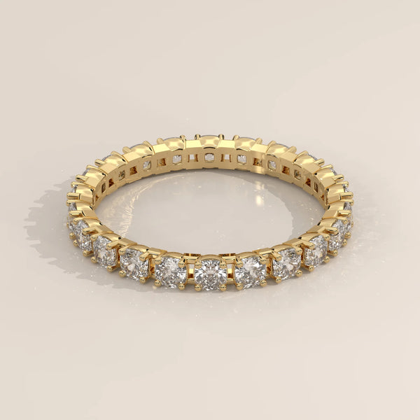 Three-Quarter View: Cushion Diamond Eternity Ring with Eternity Setting in Yellow Gold – Lab Grown – Driona Jewels