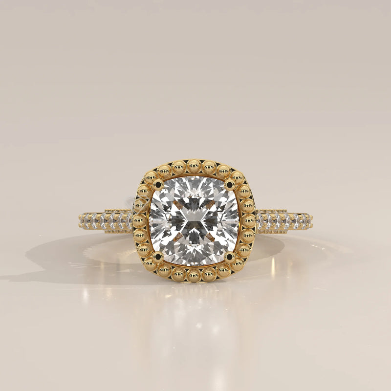 14k yellow gold ring with a cushion cut diamond halo.