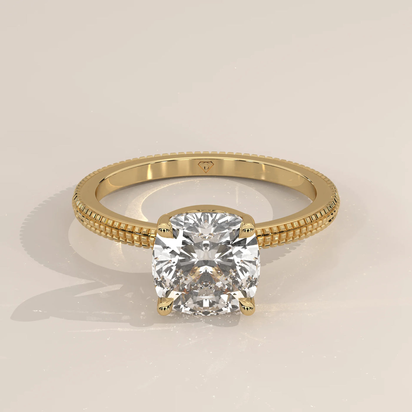 Yellow gold engagement ring with a large cushion-cut diamond.