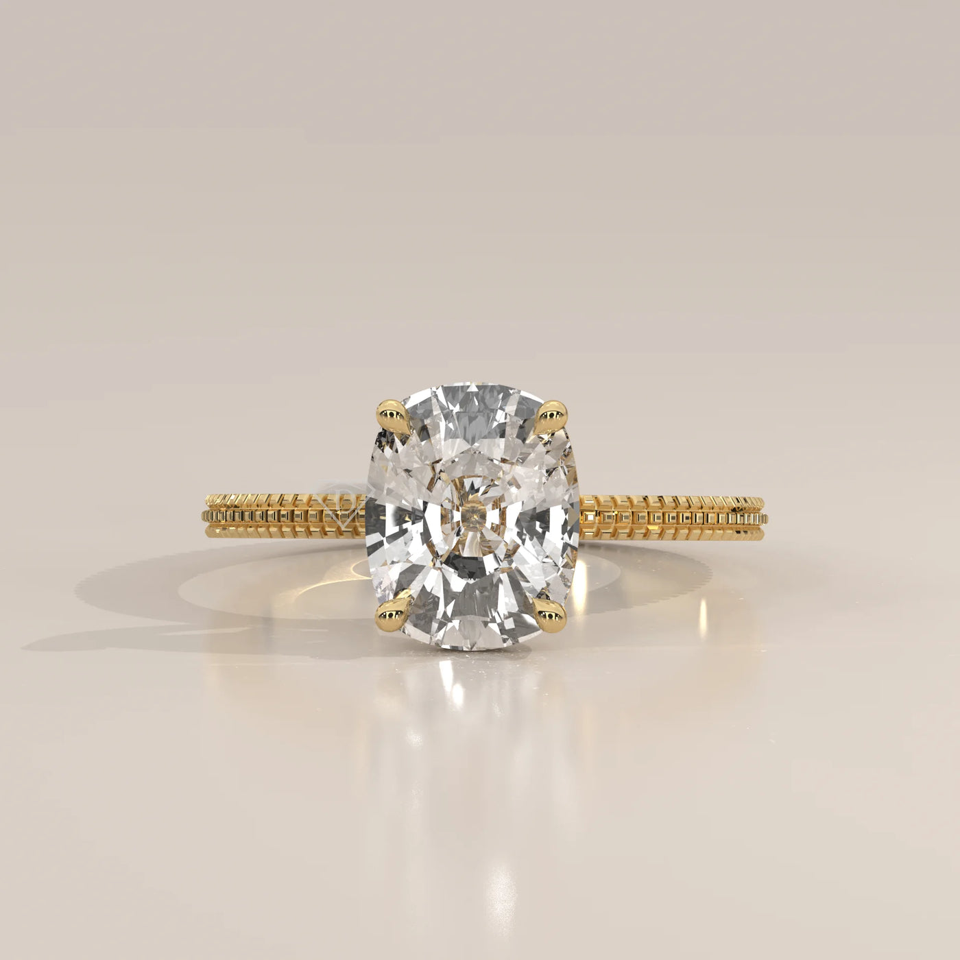 Yellow gold ring with a large, sparkling cushion-cut diamond.