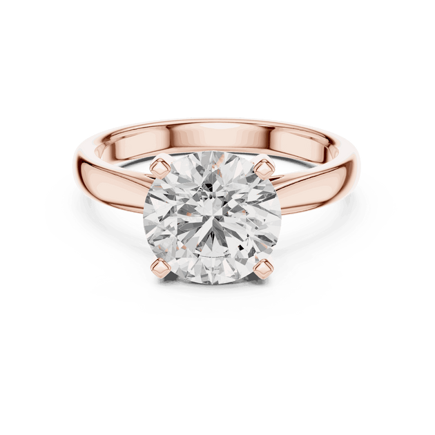 Round Cut Solitaire Engagement Ring in Solid Gold