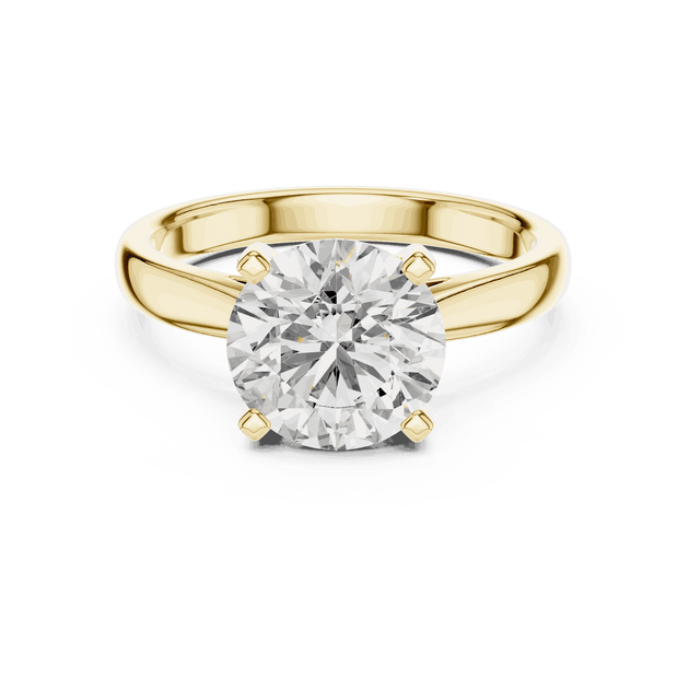 Round Cut Solitaire Engagement Ring in Solid Gold