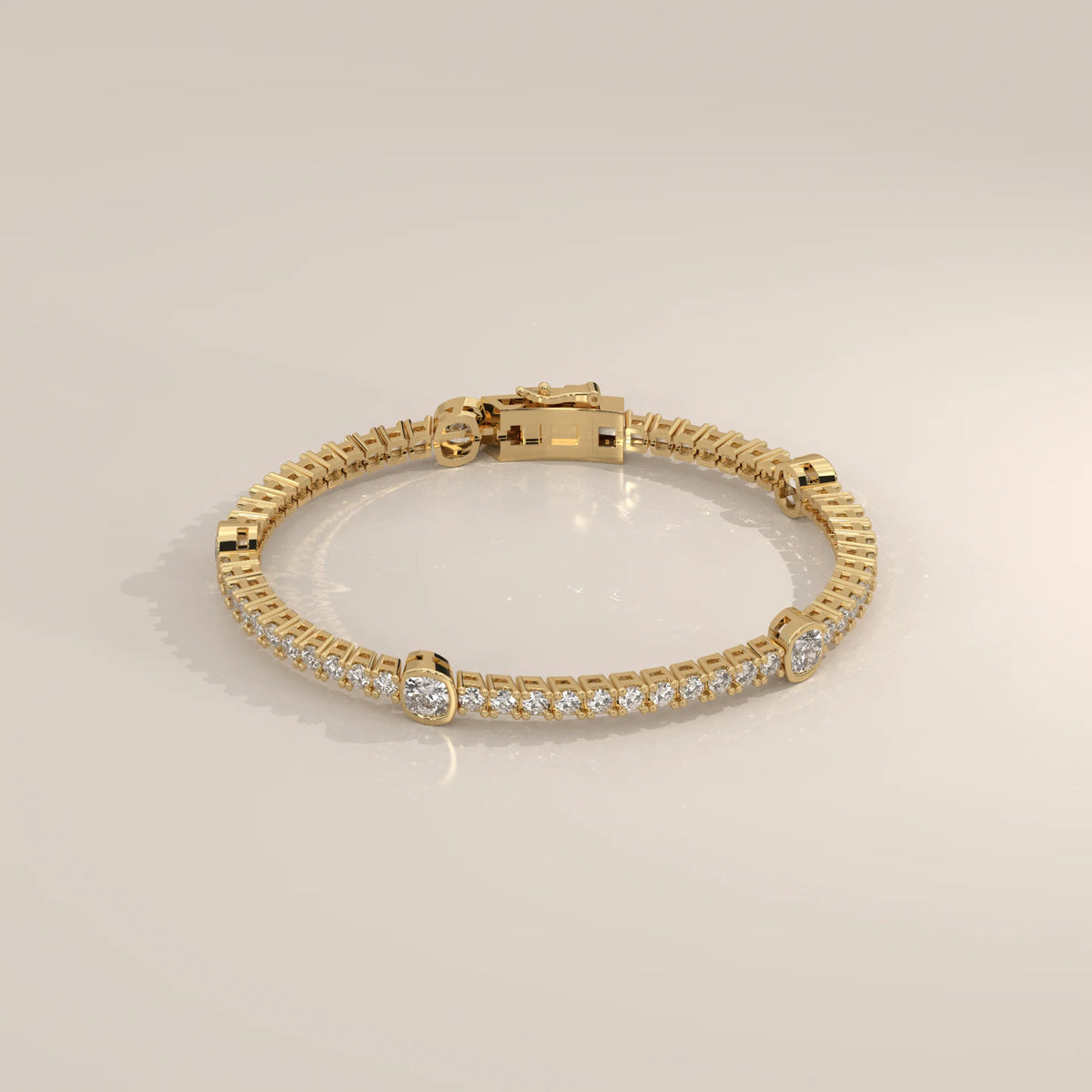 Cushion Station Lab Grown Diamond Tennis Bracelet with Round Line in yellow gold, shown on a plain background.