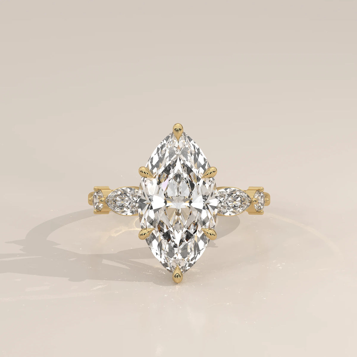 Daiva 5 Carat Marquise Lab Grown Diamond Ring, East West Accents in yellow gold, photographed head-on.