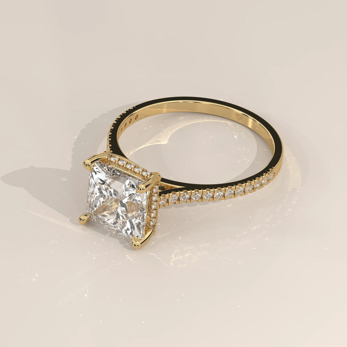 Daphne 5 Carat Princess Lab Grown Diamond Ring, Hidden Halo Pave in yellow gold, shown from the side.