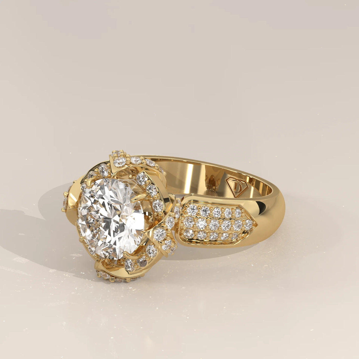 A stunning 14k yellow gold engagement ring featuring a large center diamond surrounded by smaller diamonds.