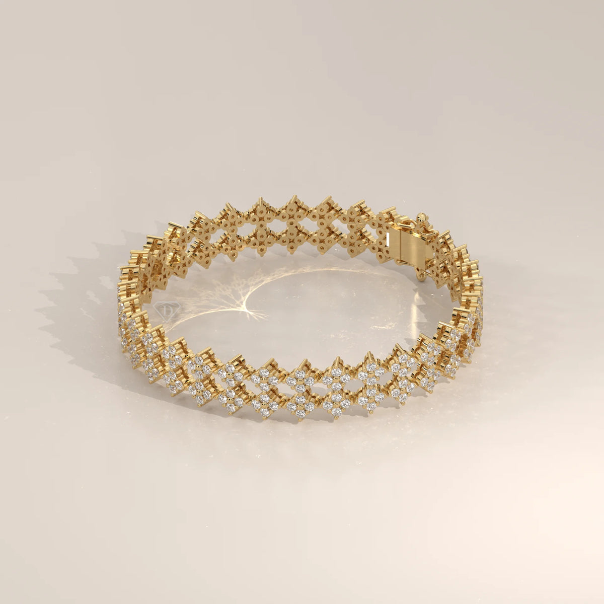 Gold geometric bracelet with diamonds on a light background.