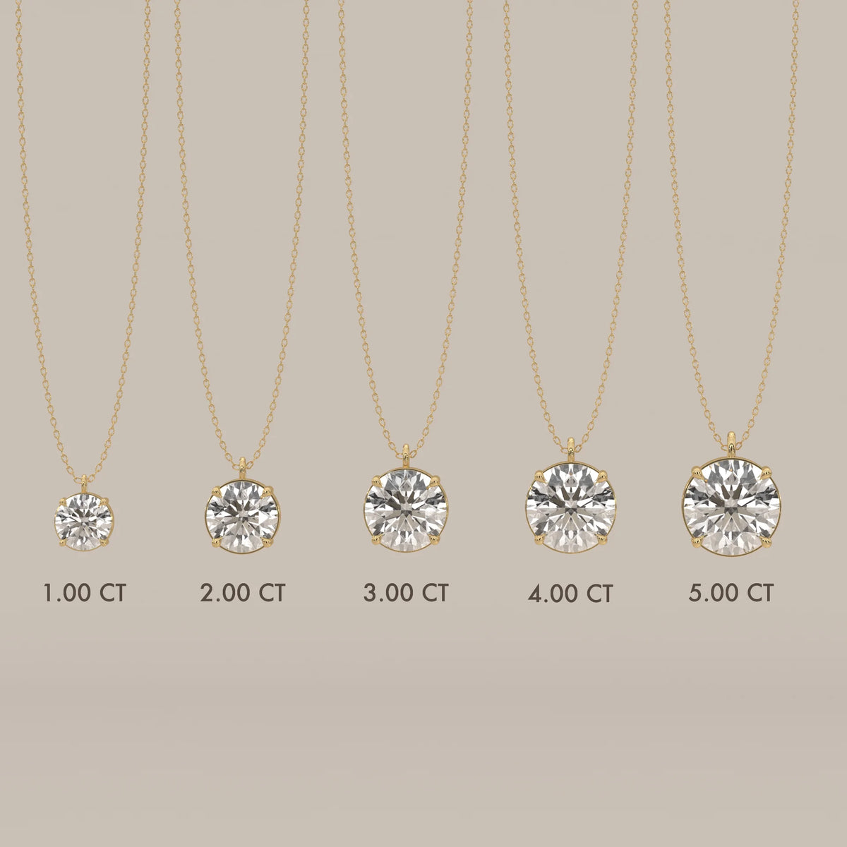 Five diamond pendants of increasing size on delicate gold chains.