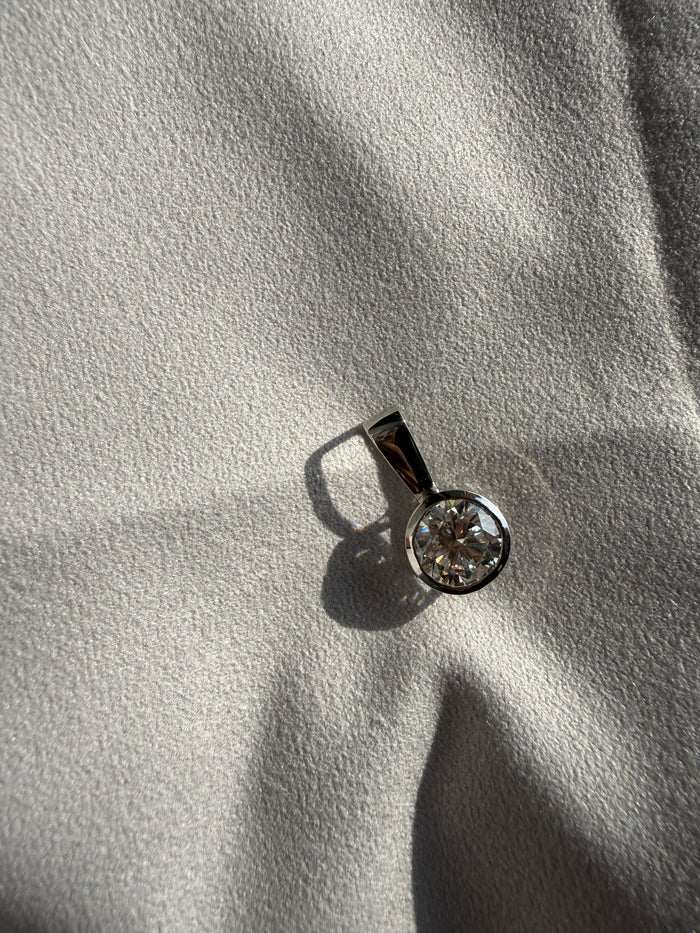 Bezel-set solitaire pendant
