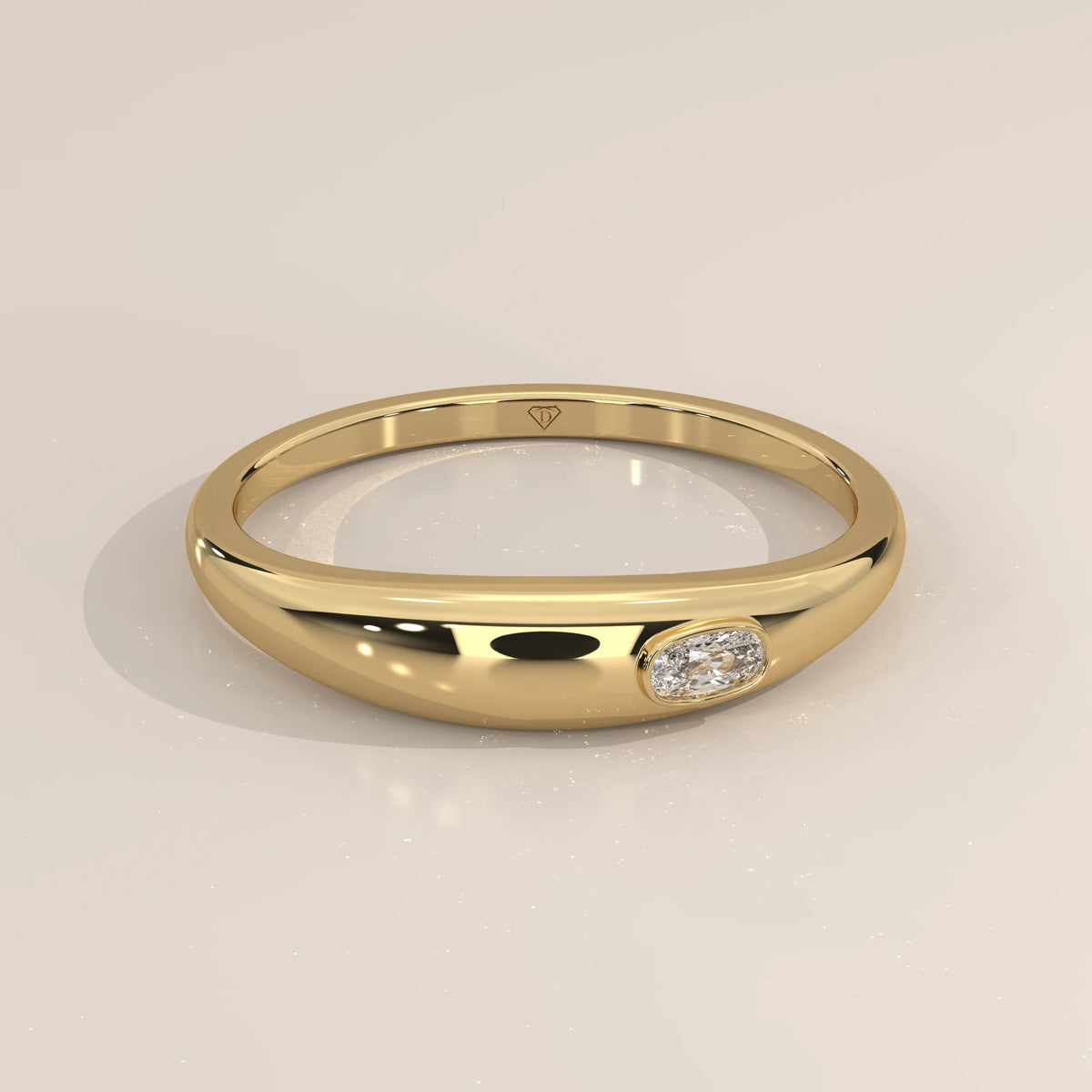 Domed Gold Band with a Flush Set Elongated Cushion Diamond in yellow gold, shown at an angle.