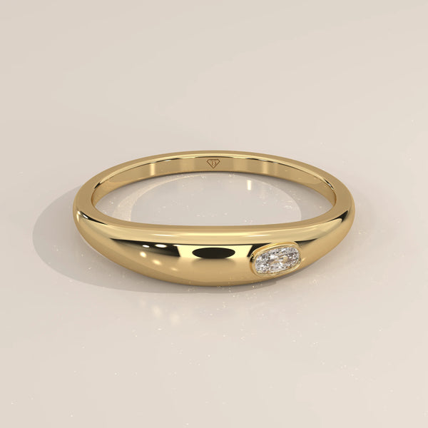 Domed Gold Band with a Flush Set Elongated Cushion Diamond in yellow gold, shown at an angle.