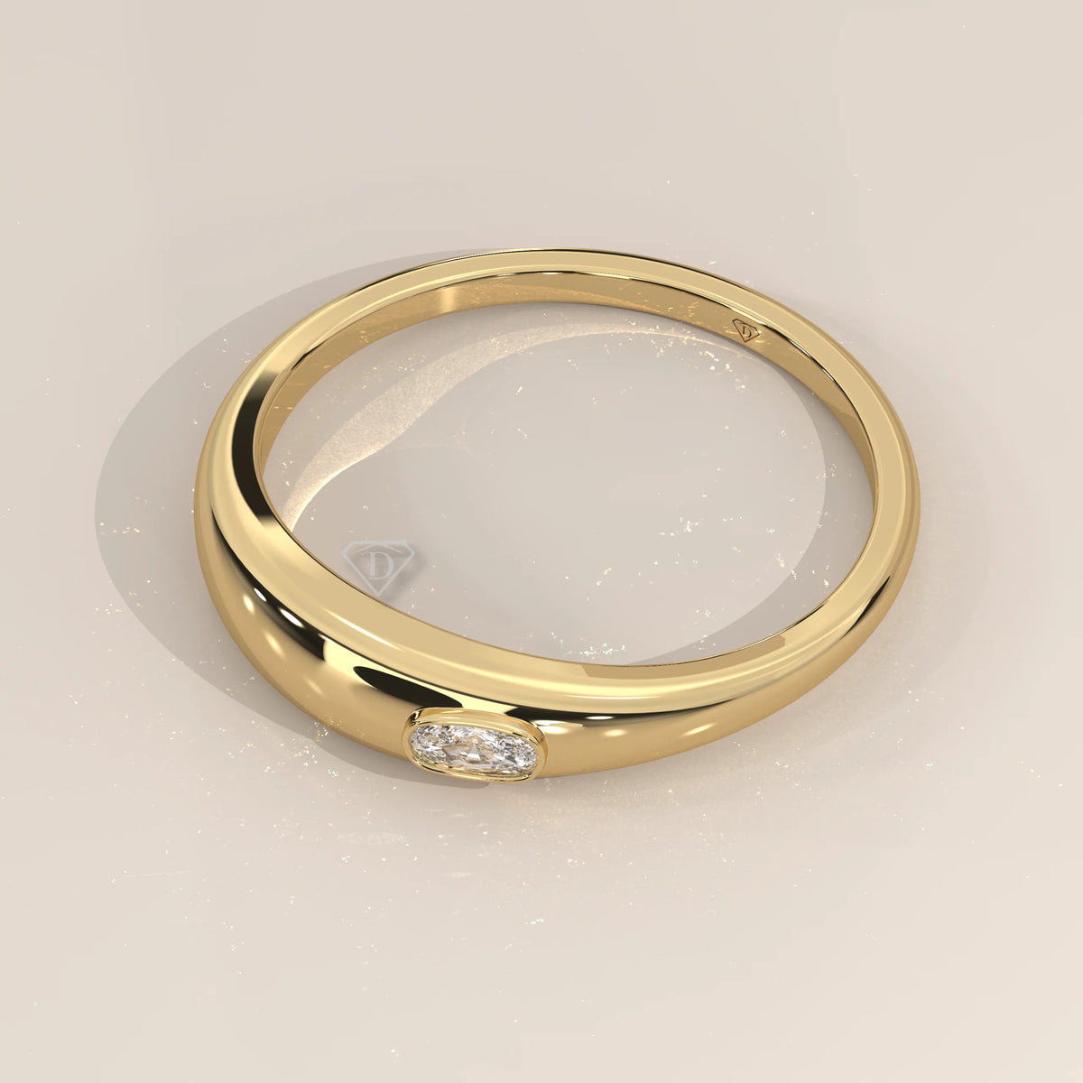 Domed Gold Band with a Flush Set Elongated Cushion Diamond in yellow gold, photographed at a three-quarter angle.