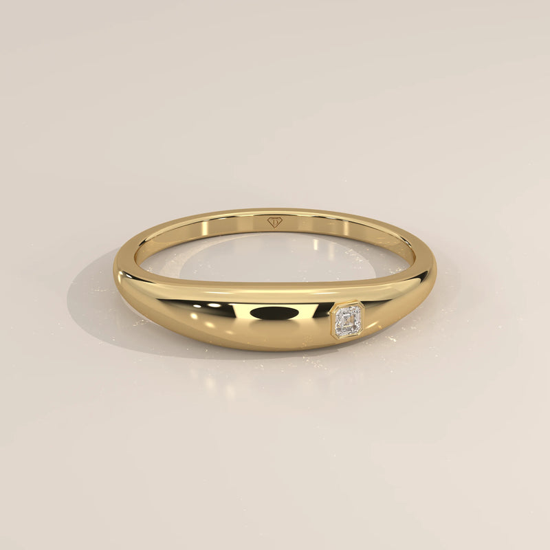 Domed Gold Band with a Flush Set Square Step Cut Diamond in yellow gold, shown from the front.