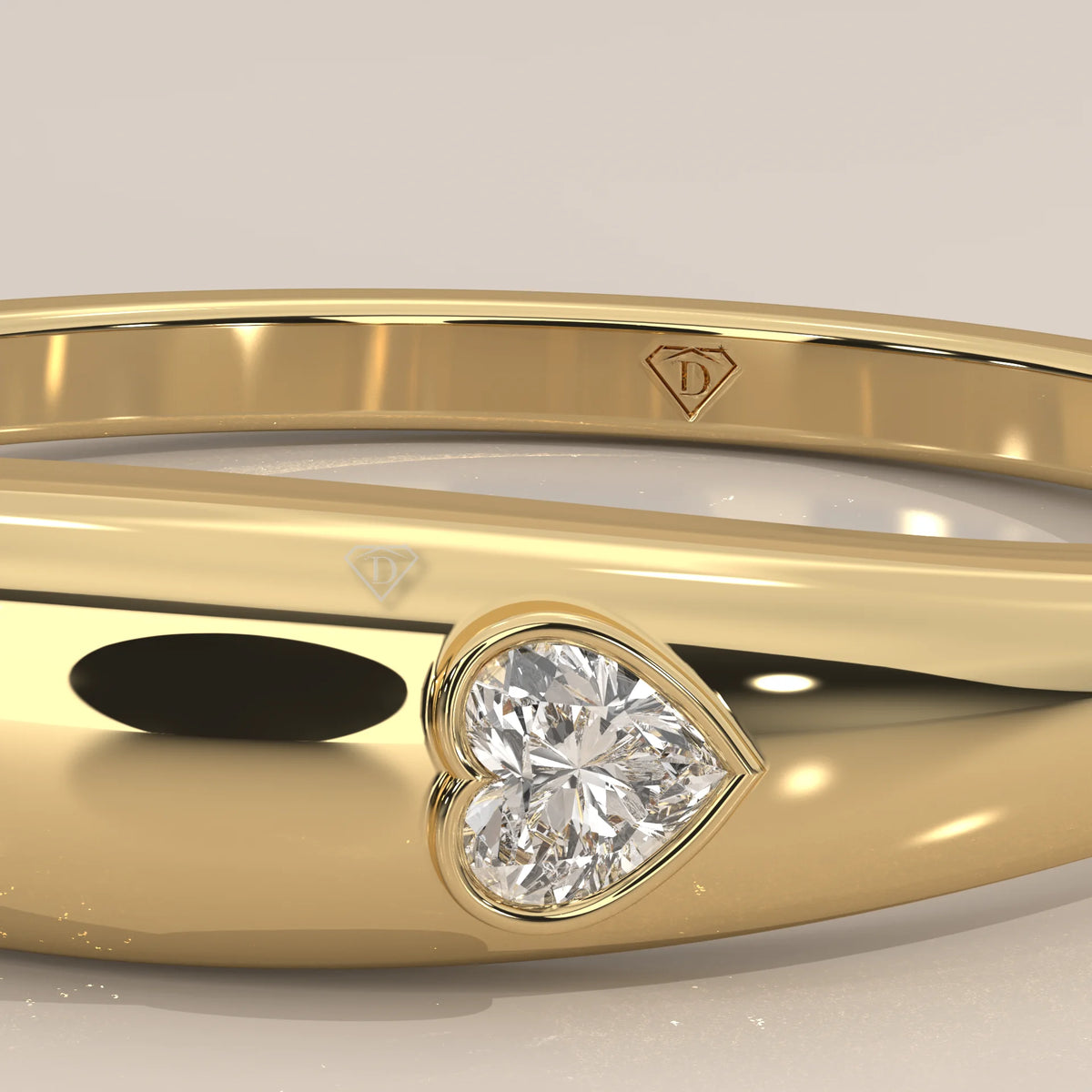 Domed Gold Band with a Small Flush Set Heart Diamond in yellow gold, product photograph on a plain background.