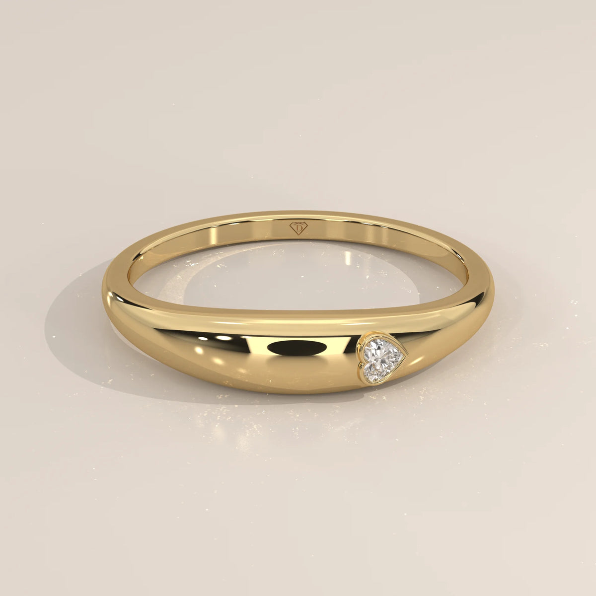 Domed Gold Band with a Small Flush Set Heart Diamond in yellow gold, shown from the front.