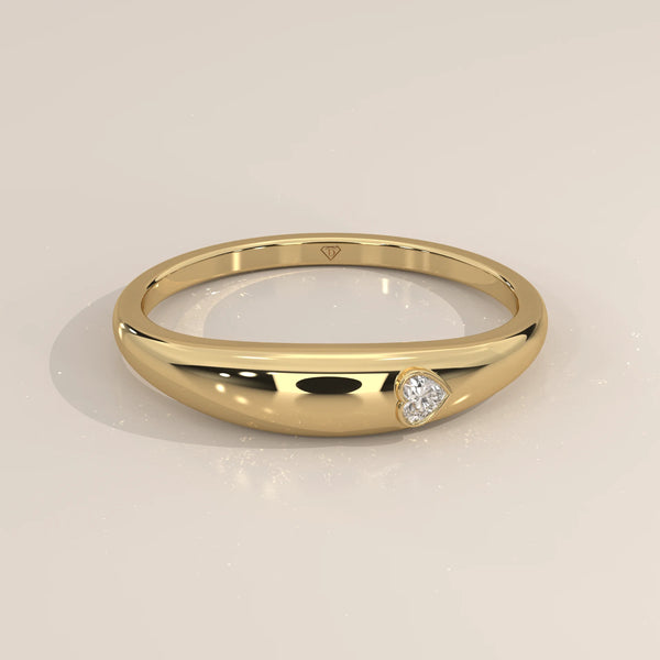 Domed Gold Band with a Small Flush Set Heart Diamond in yellow gold, shown from the front.