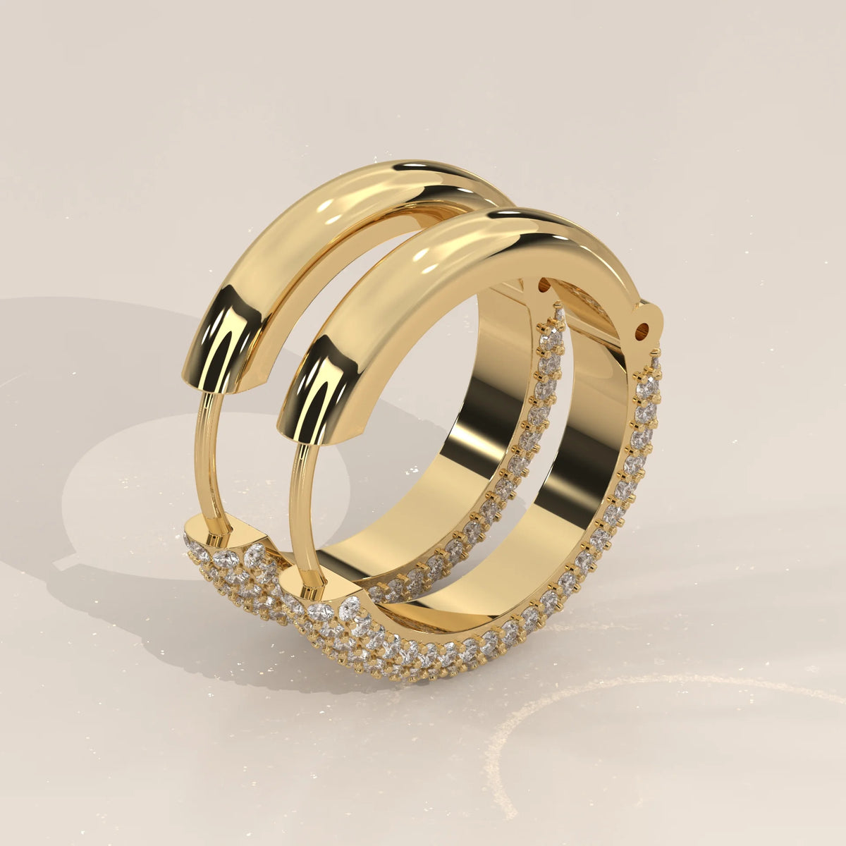 Domed Pave Round Lab Grown Diamond Hoop Earrings with Hinged Snap in yellow gold, product photograph on a plain background.