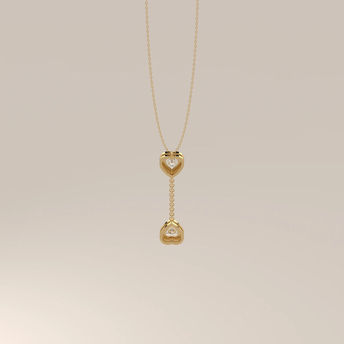 Double Bezel Heart Lab Grown Diamond Lariat Drop Pendant in yellow gold, photographed head-on.