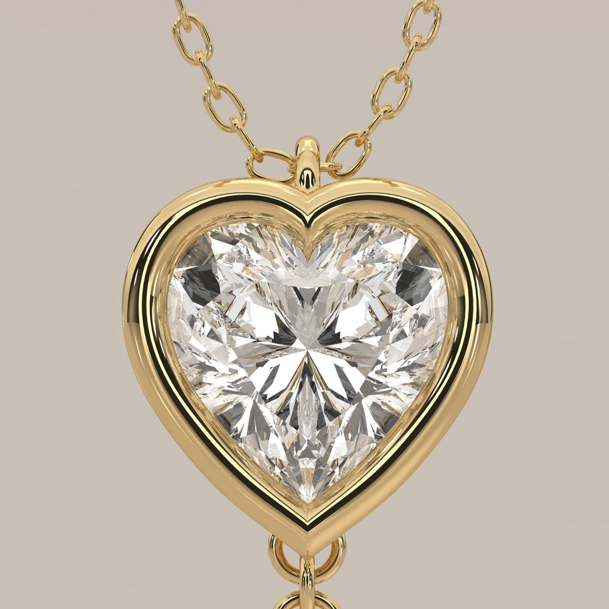 Double Bezel Heart Lab Grown Diamond Lariat Drop Pendant in yellow gold, shown on a plain background.