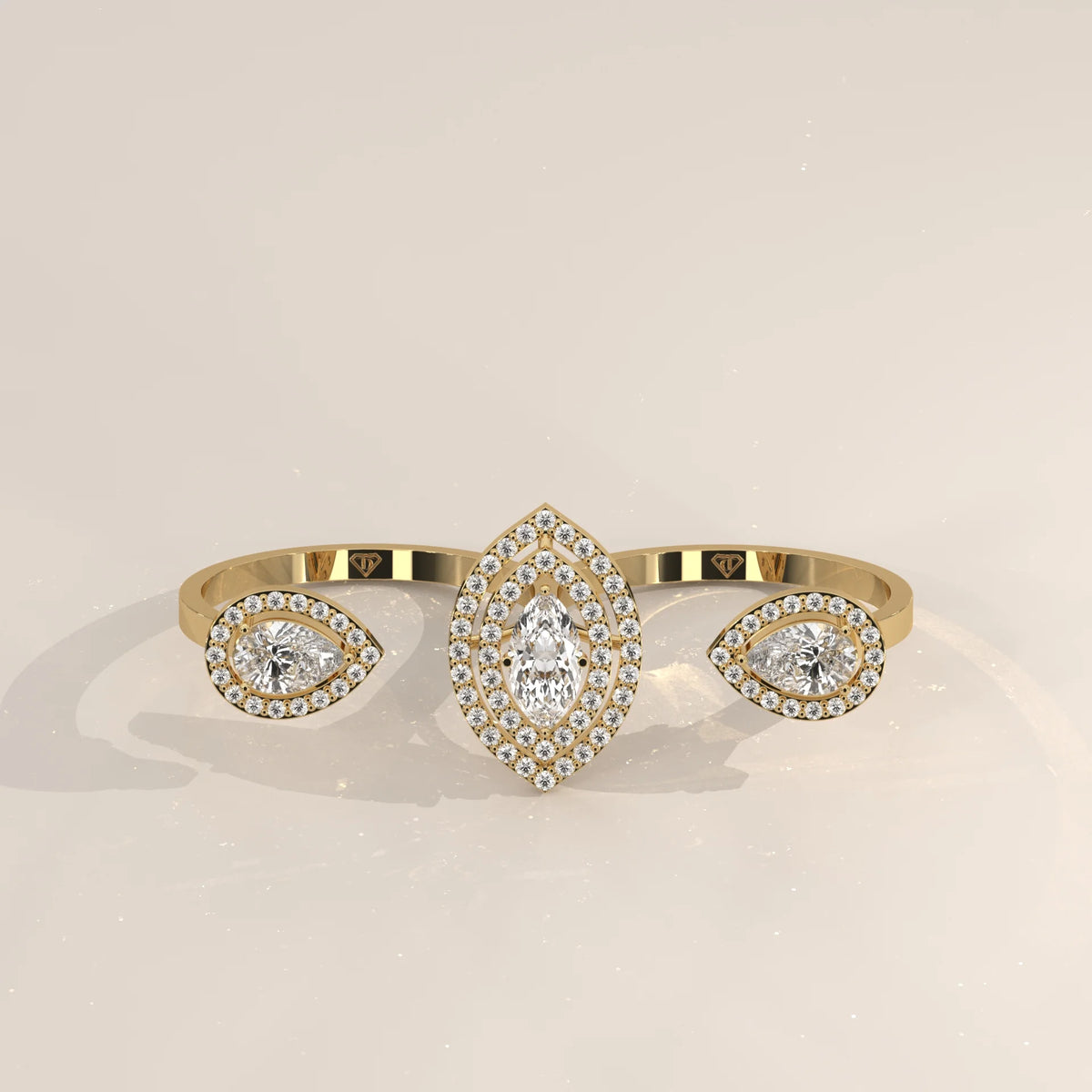 Marquise Lab Grown Diamond Double Halo Two Finger Ring with Pear Ends in yellow gold, shown from the front.