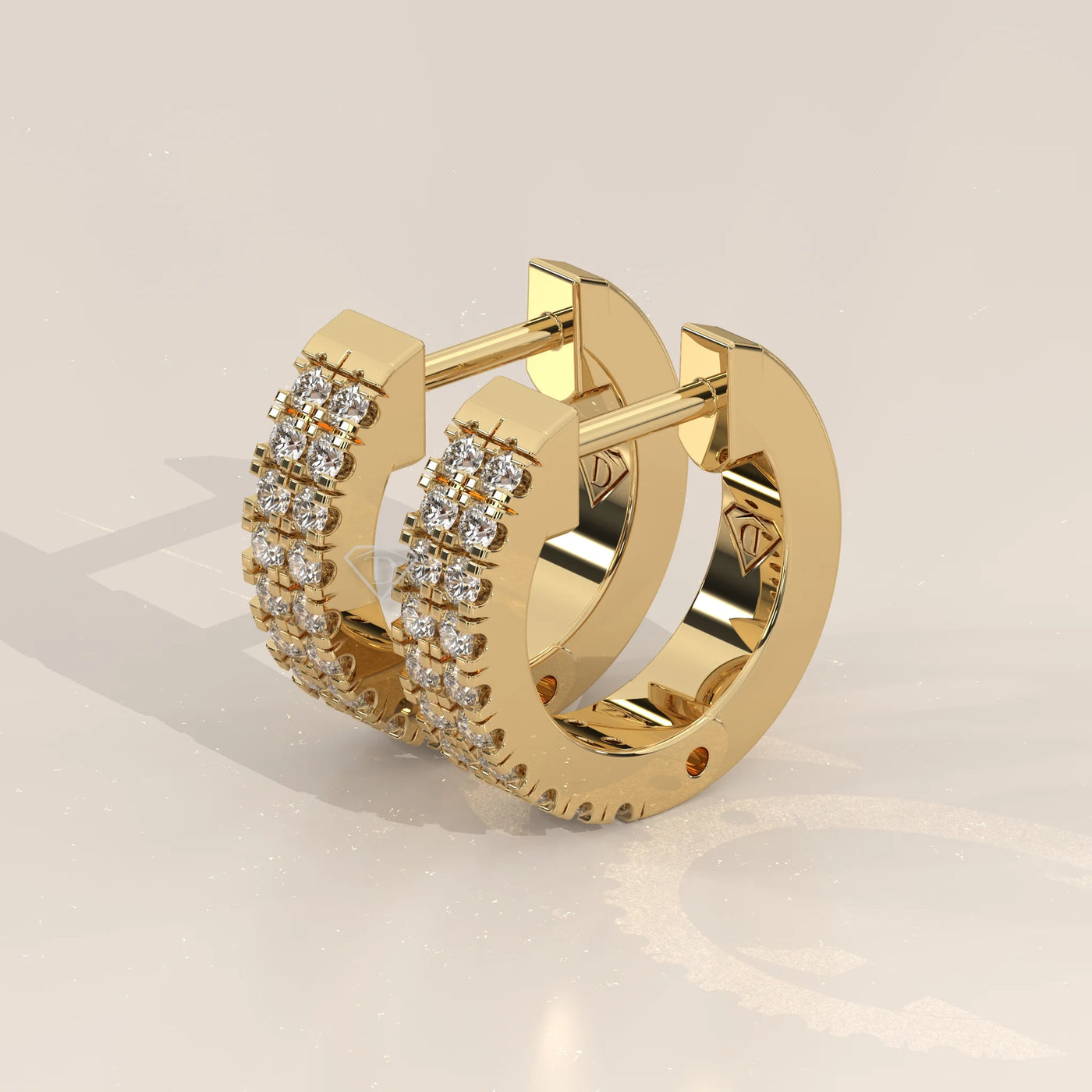 Three-Quarter View: Round Diamond Huggie Hoop Earrings with Prong Setting in Yellow Gold – Lab Grown – Driona Jewels