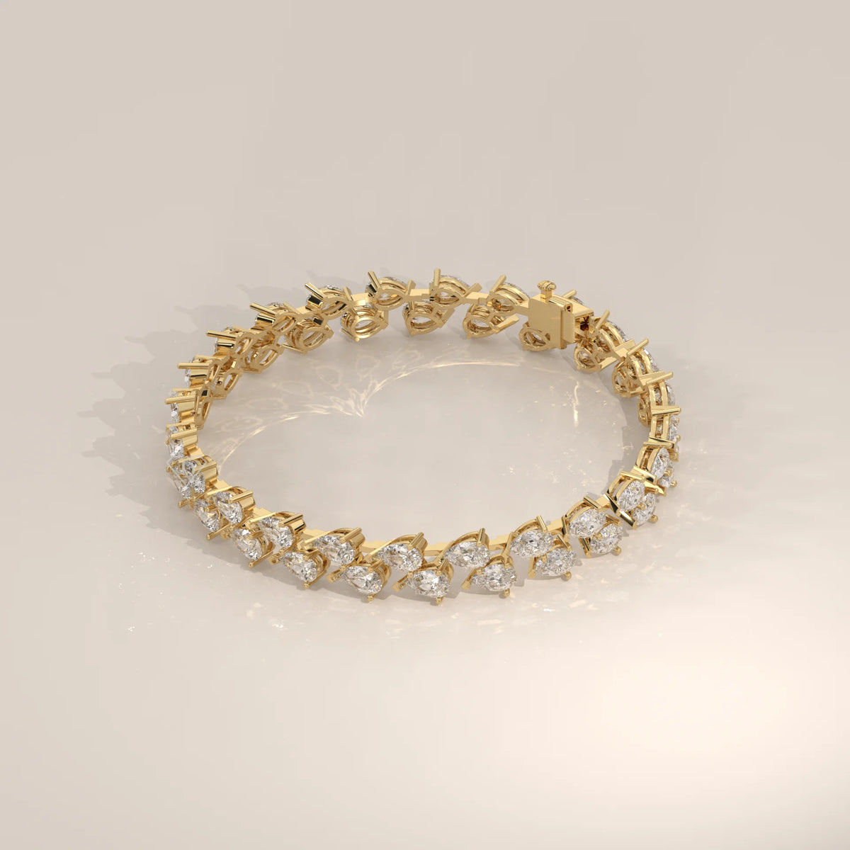 Double Row Tilted Pear Lab Grown Diamond Tennis Bracelet in yellow gold, photographed head-on.